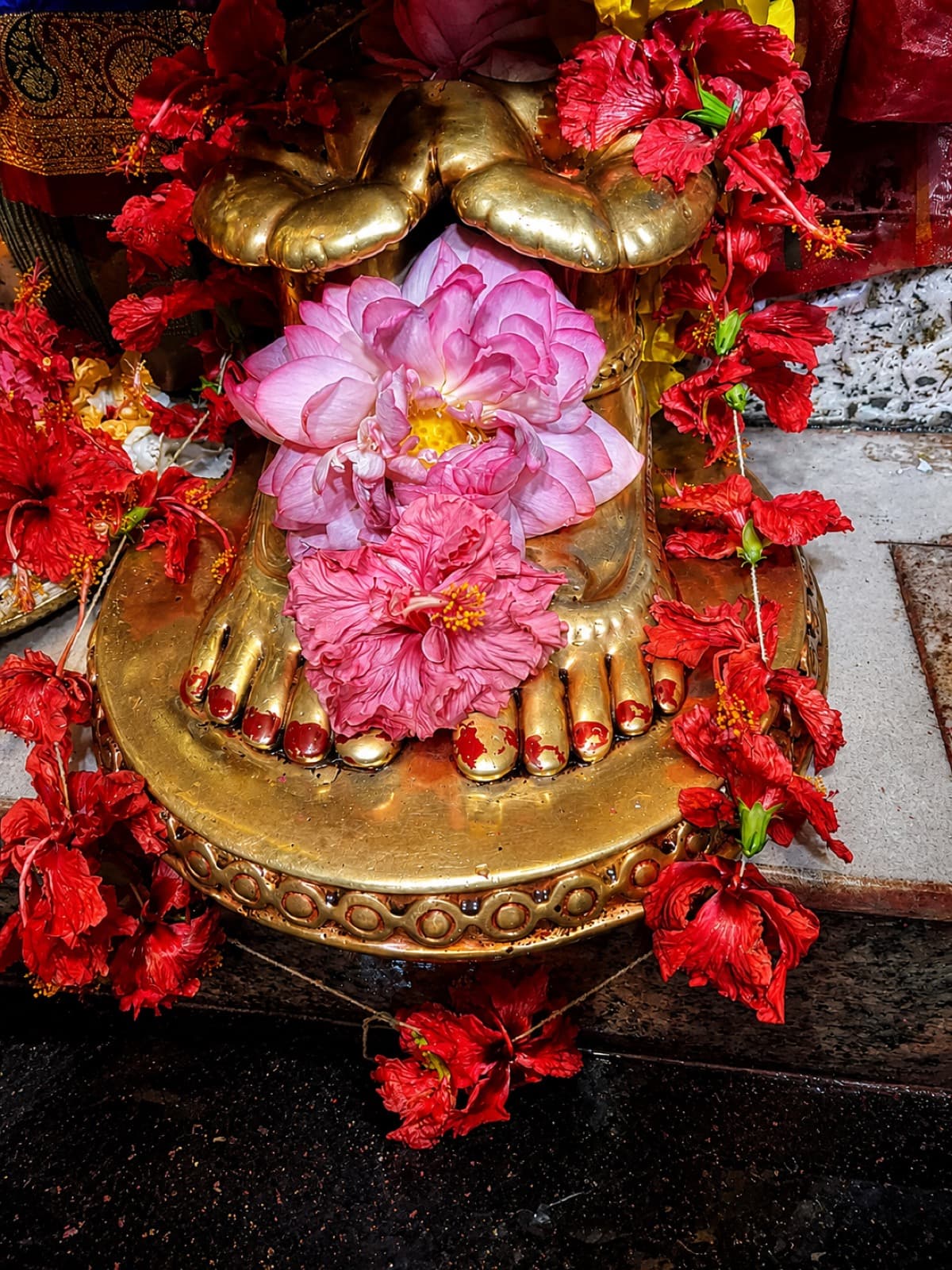 Sacred offerings at the feet of Maa Tara, Tarapith